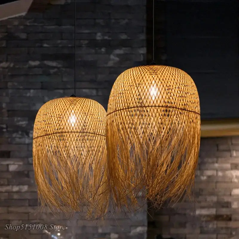 Two warm-toned decorbites bamboo pendant lights with natural golden hue and fringed edges for dining room decor