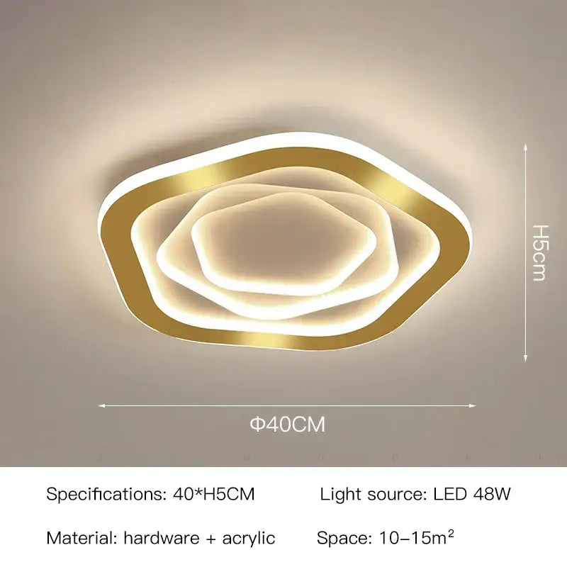 Modern hexagonal gold luxury led ceiling chandelier with layered acrylic rings emitting warm glow for living room decorbites gold luxury