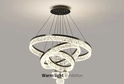 Modern black-framed chandelier with interlocking crystal rings and spherical LED lights for living and dining rooms