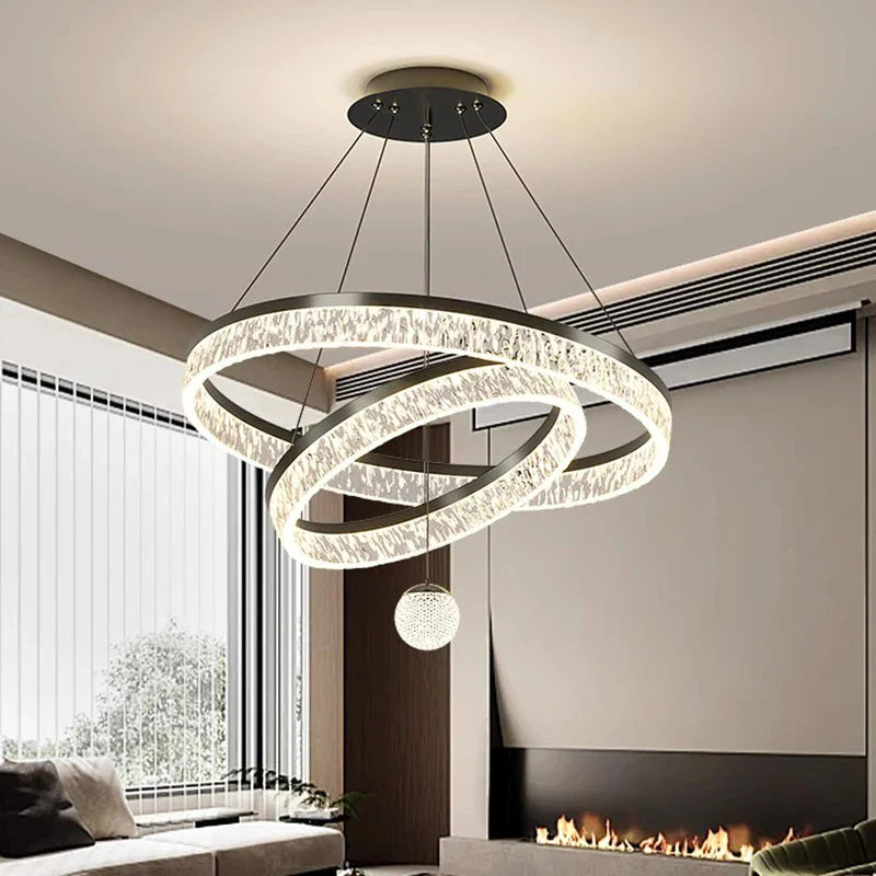 Modern black and clear crystal ring chandelier with spherical pendant light for living and dining room lighting