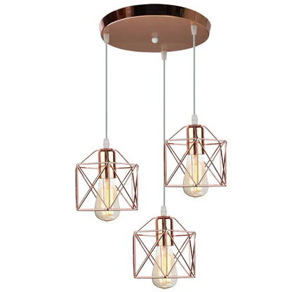 Rose gold geometric pendant light with three cage pendant light shades and exposed filament bulbs for dining room decorbites cage pendant