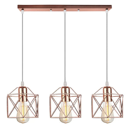Three rose gold geometric wire cage pendant lights with exposed bulbs for modern industrial dining room decorbites cage pendant