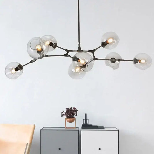 Modern black metal globe glass chandelier with clear bulbs for dining room decorbites industrial globe light