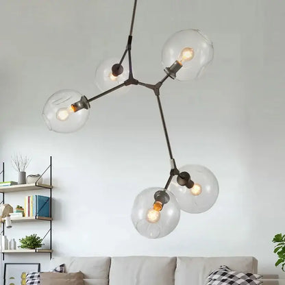 Modern industrial globe glass chandelier in black metal with five clear globes for dining room decorbites industrial globe lighting