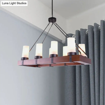 Modern rectangular industrial multi-light pendant with dark bronze frame warm white opal glass shades ideal for islands