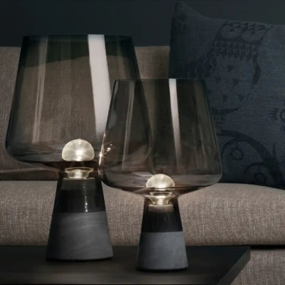 Modern industrial table lamp with dark smoked glass shades and leimu cement bases featuring glowing bulbs for bedroom decorbites leimu cement table