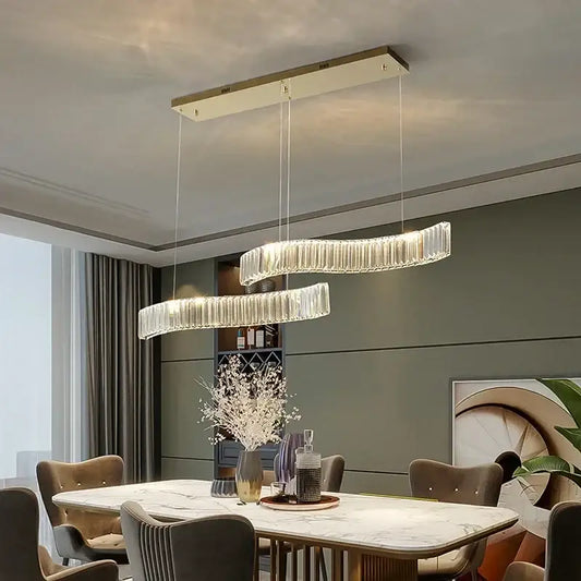Modern interlocking crystal led ceiling chandelier with two curved glass rings emitting warm glow for dining room decorbites crystal led