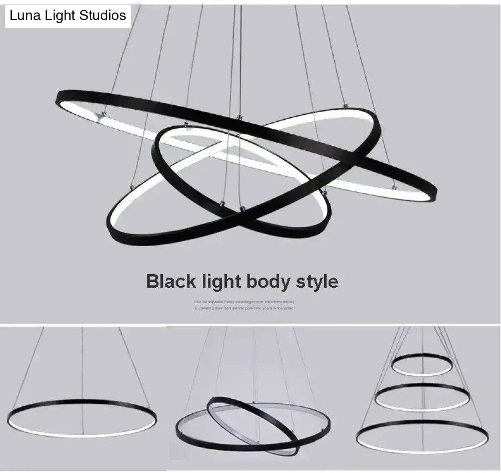 Modern black and white led pendant lights with sleek interlocking ring design for dining room use