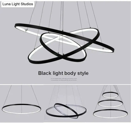 Modern black and white led pendant lights with sleek interlocking ring design for dining room use