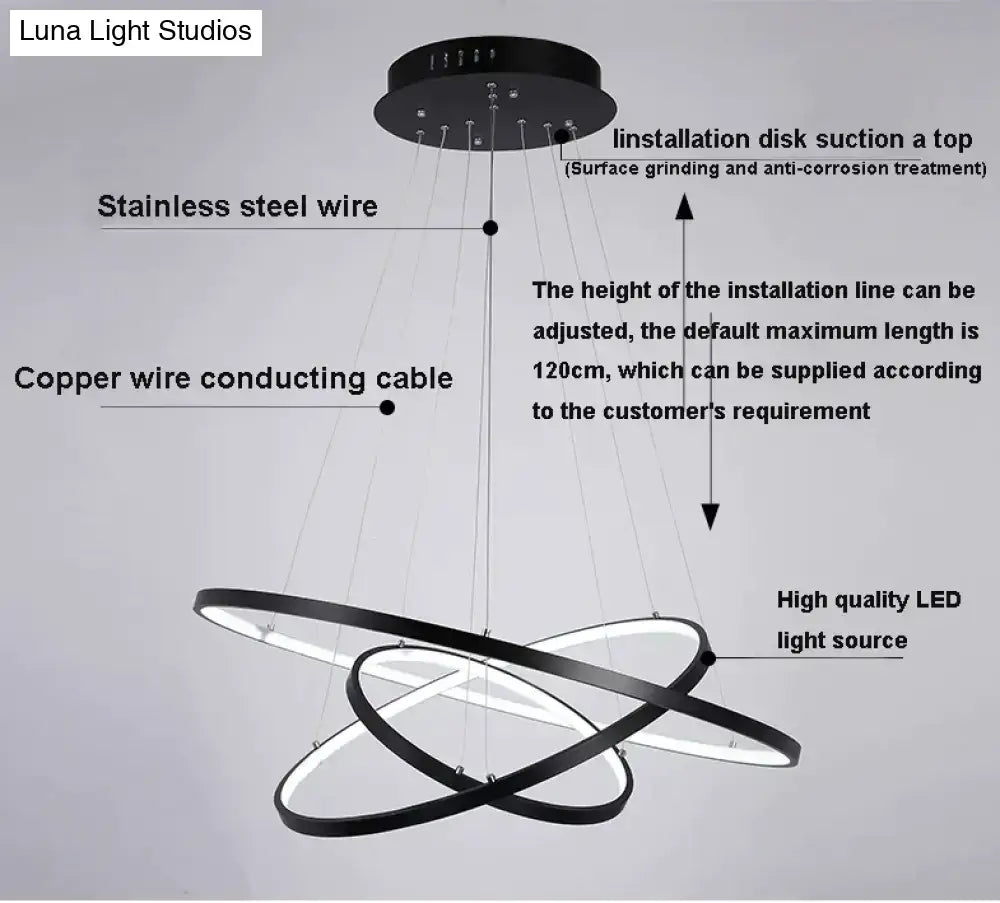 Modern pendant lights featuring black circular led interlocking rings with polished stainless steel base for dining room