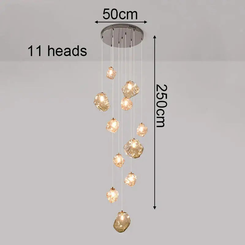 Modern iron and glass pendant light with 11 amber glass lights as a statement piece and focal point for dining rooms