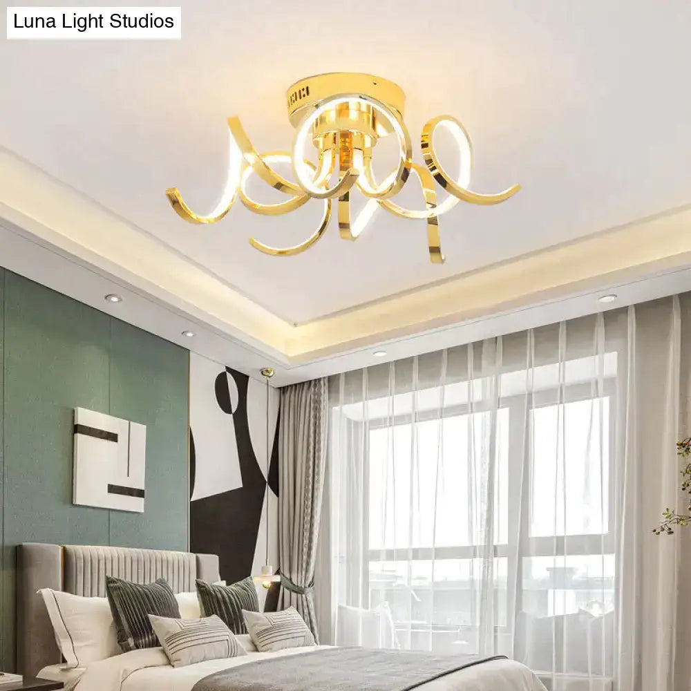 Gold-toned DecorBites™ LED modern iron crystal pendant light with sleek curved arms and integrated LED lighting body material aluminum