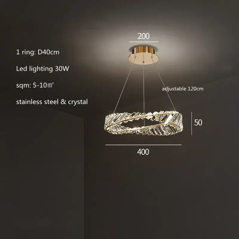A modern irregular gold steel pendant light with adjustable length and crystal accents for dining room decorbites irregular gold