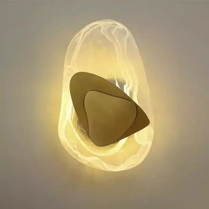 Modern irregular graphic wall light with amber frosted glass and layered bronze accents for bedroom decorbites irregular graphic wall
