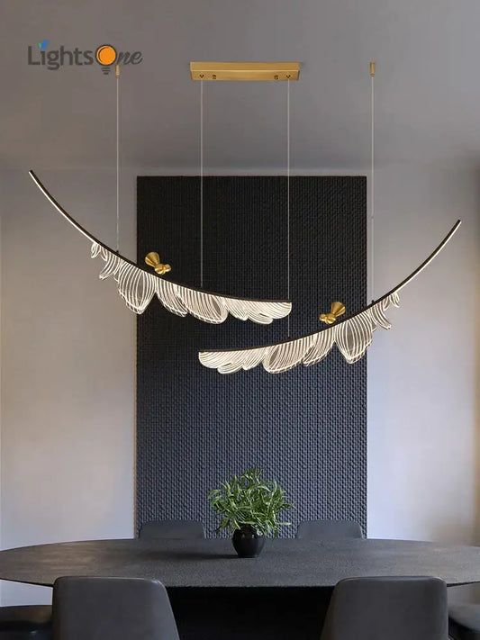 Modern italian copper chandelier gold bird pendant light with gold-toned feather design and intricate white detailing by decorbites italian copper