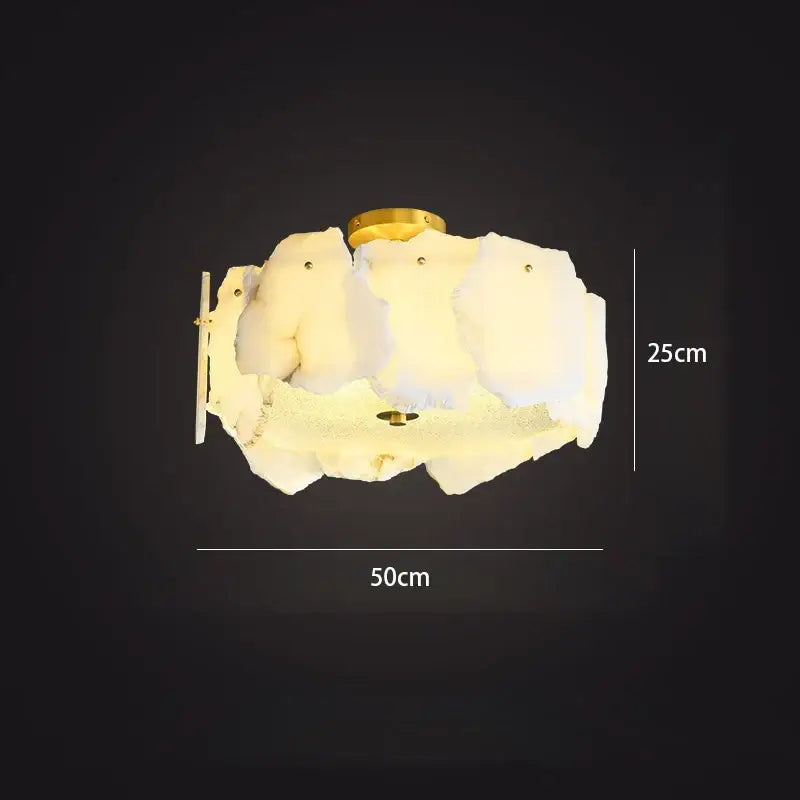 Modern ivory white marble led ceiling light with cream cloud shape and gold-toned metal base for decorbites ivory white decor