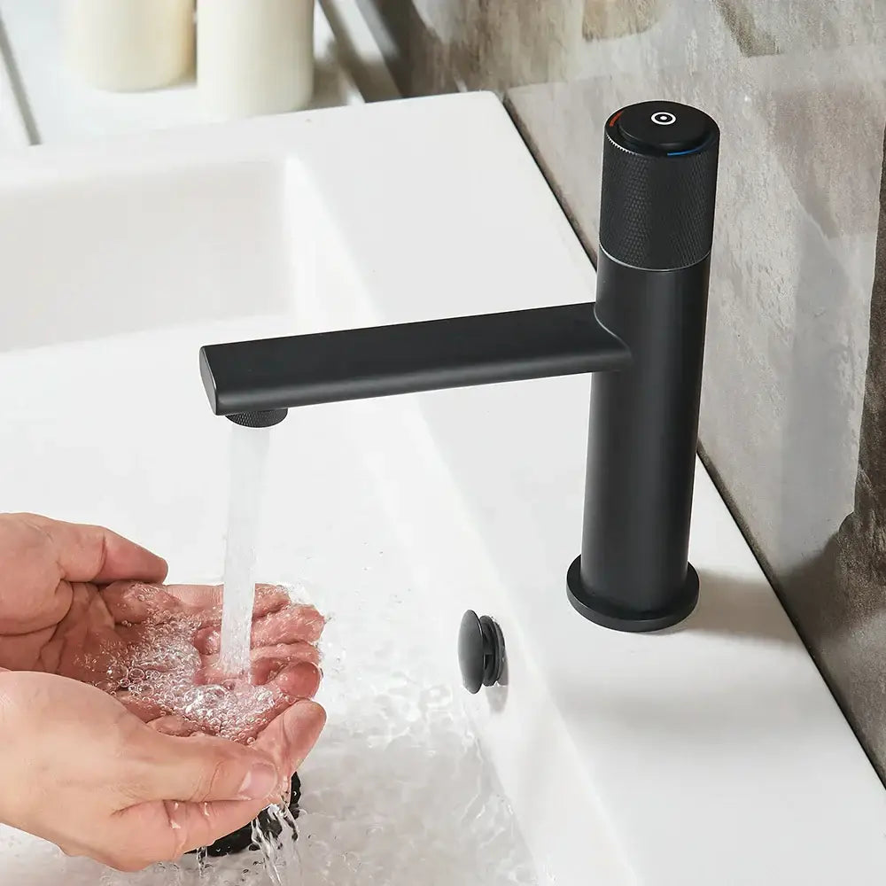 Black matte finish single handle bathroom faucet with sleek minimalist design and touch-sensitive decorbites gold single knob