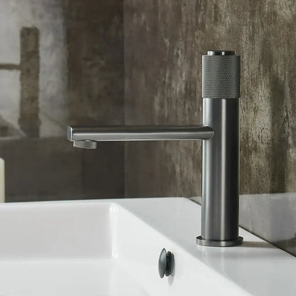 Modern matte black single handle bathroom faucet with textured knurled handle and decorbites gold single mixer design