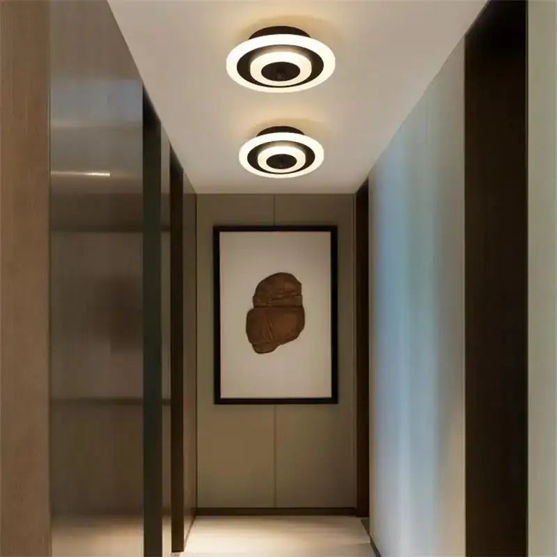 Modern layered geometric led ceiling light with black trim featuring concentric white and black rings for living room decorbites ceiling light