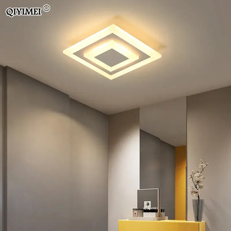 Modern layered geometric led ceiling light with black trim, warm white illumination, and sleek metallic edges for living room decorbites led ceiling