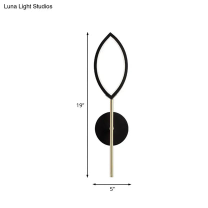 Modern leaf black and brass wall light with gold finish featuring a sleek design for living room decor