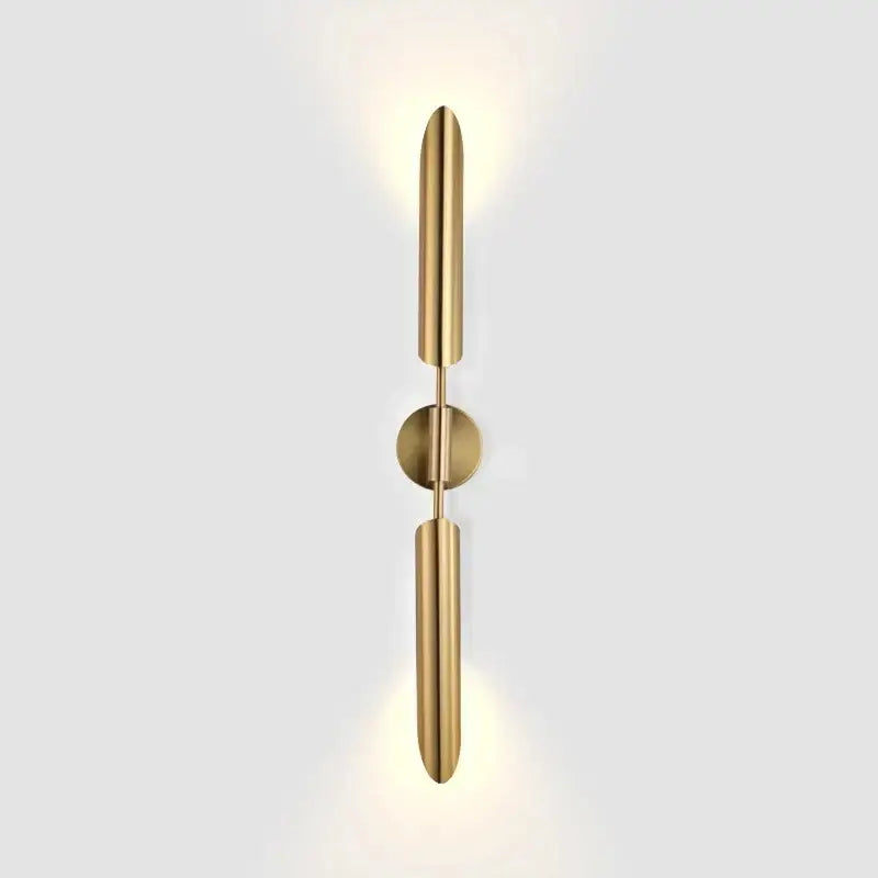 Modern leaf gold led wall lamp features a gold-toned minimalist design with sleek cylindrical arms and glass bulb decorbites gold led