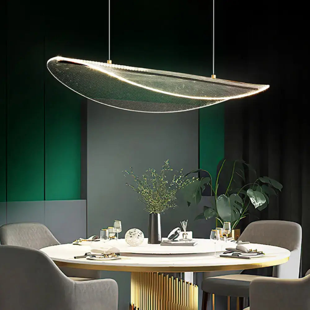 Modern gold-toned leaf shaped acrylic pendant light with curved mesh design and embedded led lighting for dining room