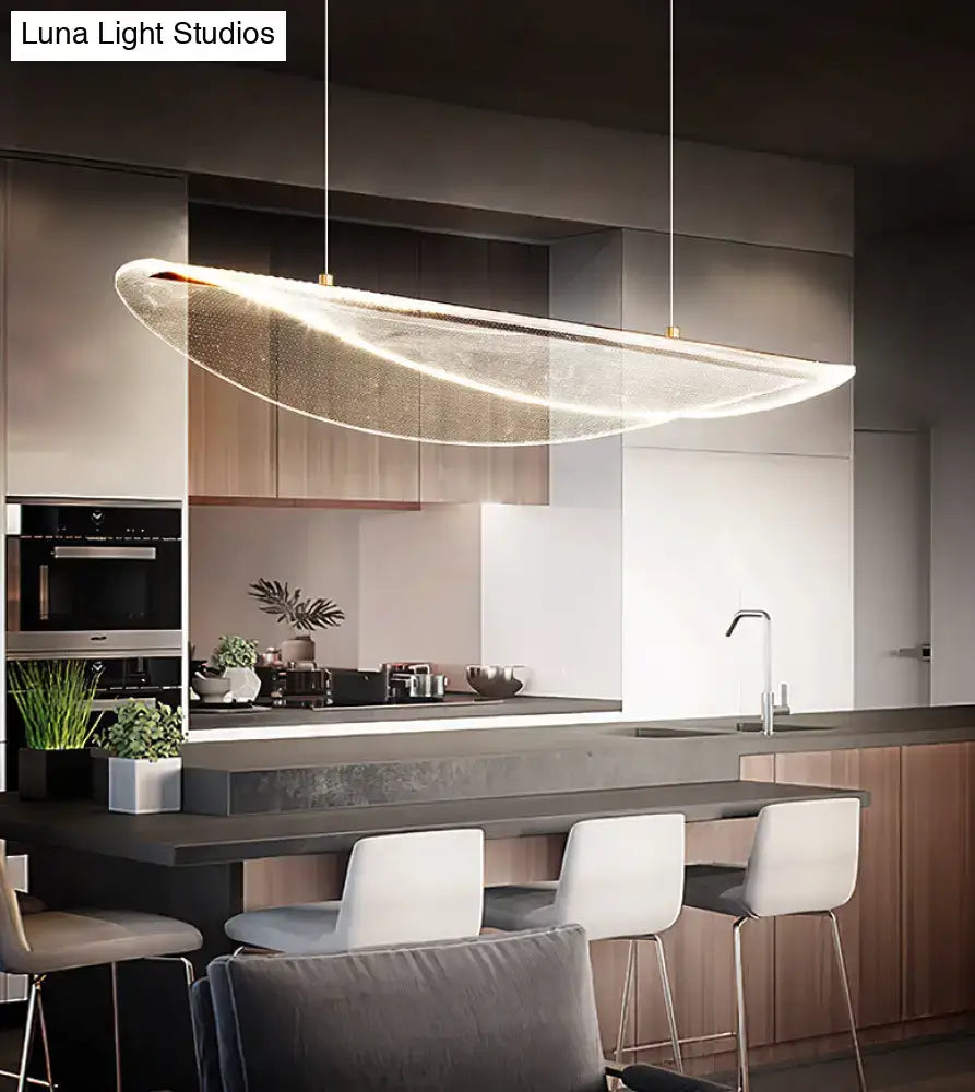 Modern leaf shaped acrylic led pendant light with sleek translucent glass and warm illumination for dining room use