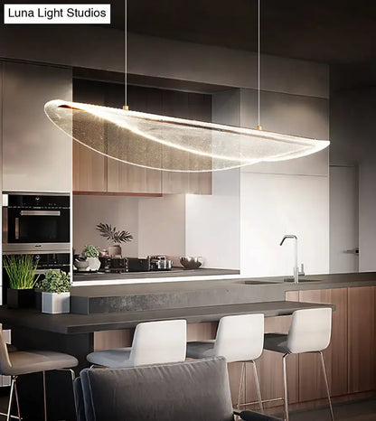 Modern leaf shaped acrylic led pendant light with sleek translucent glass and warm illumination for dining room use