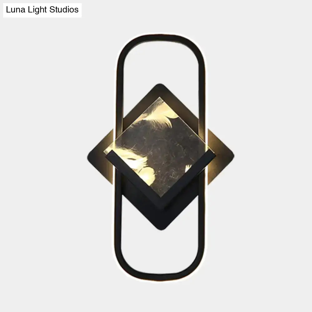 Modern black and gold geometric led acrylic wall mount lamp with a reflective diamond center for bedroom wall light