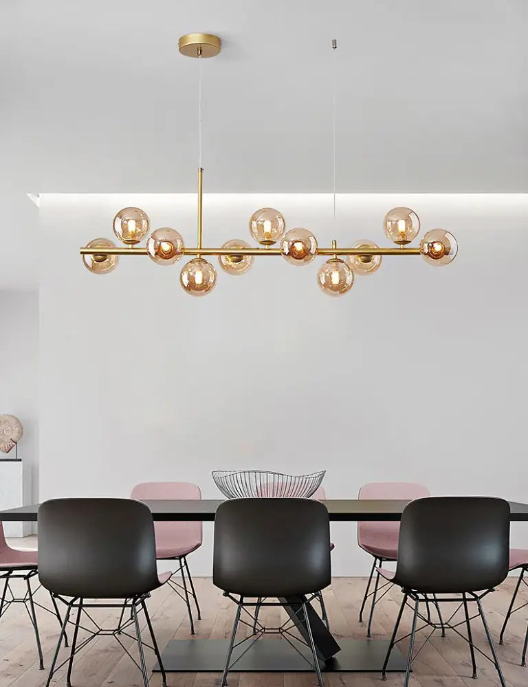 DecorBites 9-light modern chandelier with gold-toned brass rod and amber globe bulbs head ring chandelier design