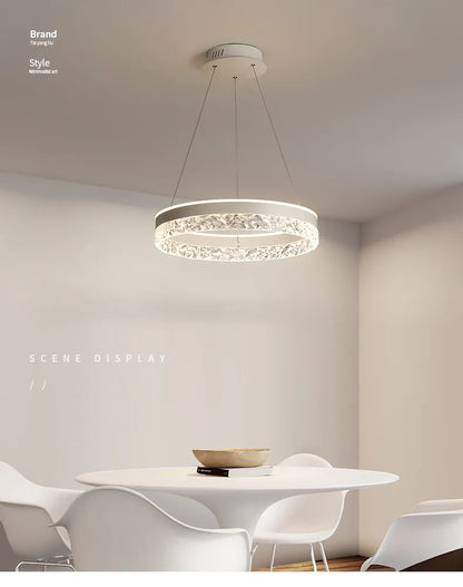 Modern white circular LED chandelier with crystal-encrusted ring and metal chains for living room and bedroom lighting