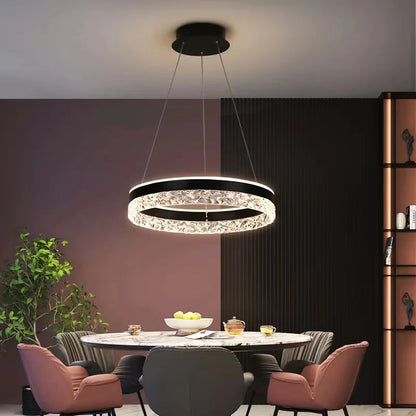 Modern black and crystal LED chandelier with sleek circular ring design for living room dining room and bedroom lighting