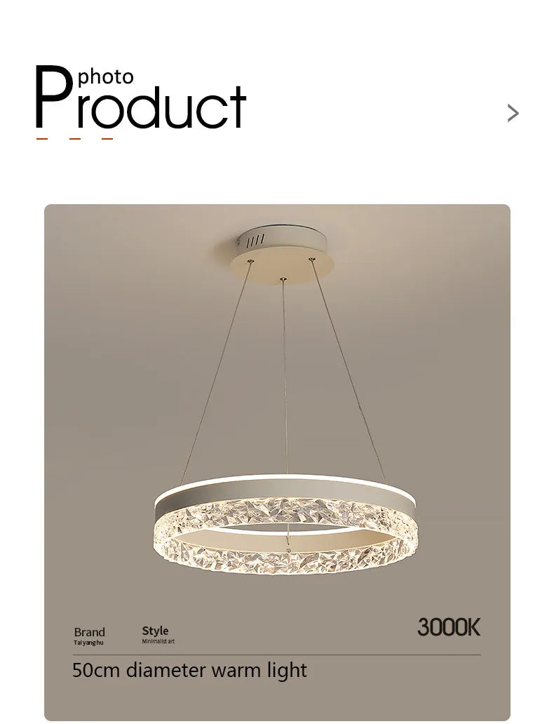 Modern LED chandelier with a sleek white frame and crystal inner ring emitting warm 3000k light for living spaces