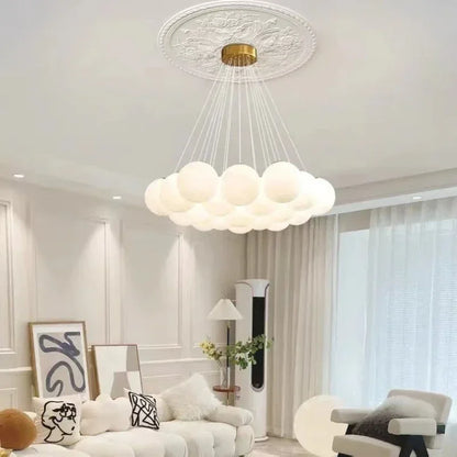 Cloud-shaped luxury led pendant light with frosted milk white glass spheres and gold-toned ceiling mount for living room