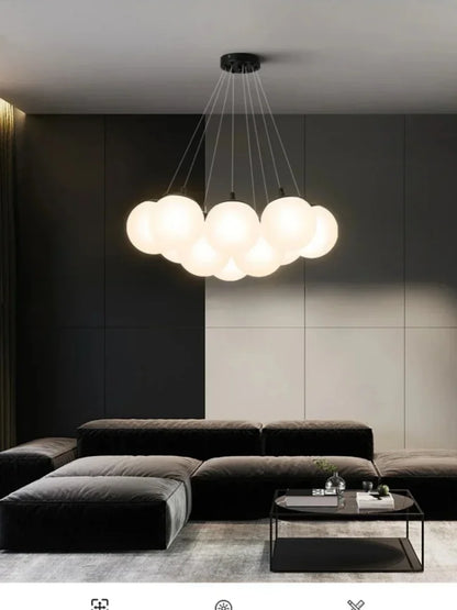 Modern cloud-shaped luxury led pendant light with frosted milk white glass globes and black metal fixture for living room