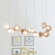 DecorBites™ modern LED geometric ceiling light with white faceted glass shades and rose gold joints for dining room use