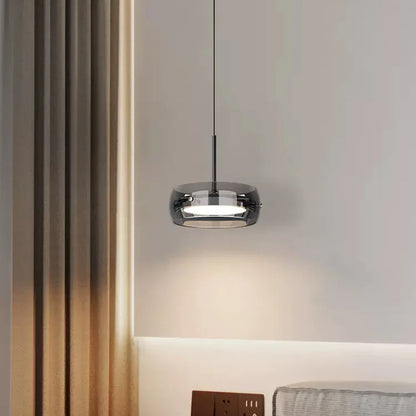 Modern led glass pendant lights with circular chrome metal frame and transparent glass shade for indoor warm lighting