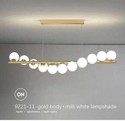 Gold-toned modern led ceiling chandelier with milk white glass spherical lampshades for dining and kitchen decor