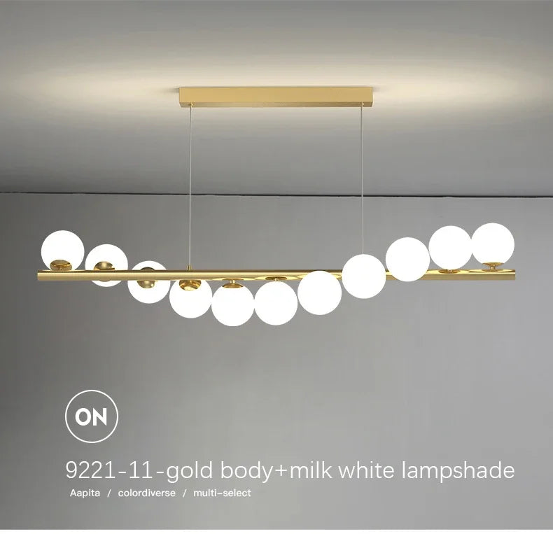 Gold-toned modern led ceiling chandelier with milk white glass spherical lampshades for dining and kitchen decor