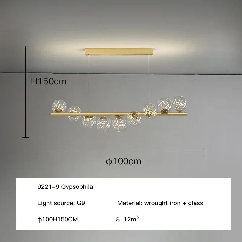 Gold-toned modern led ceiling chandelier with sleek wrought iron frame and clear glass globe shades for dining room