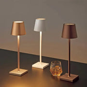 Three sleek modern led mosaic table lamps with cylindrical shades in gold white and bronze for bedroom use