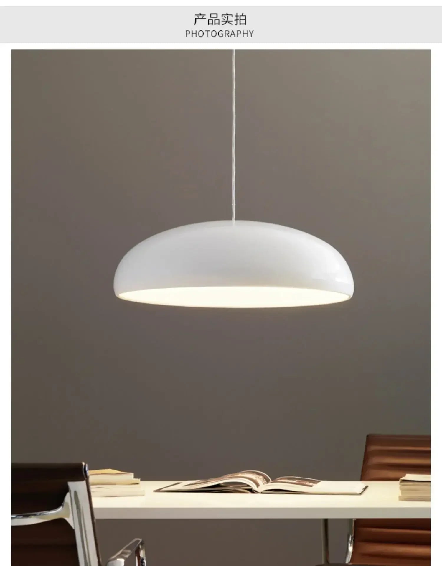 White sleek dome-shaped pendant light with round aluminum lampshade hanging, ideal for modern room decor and dining table lighting
