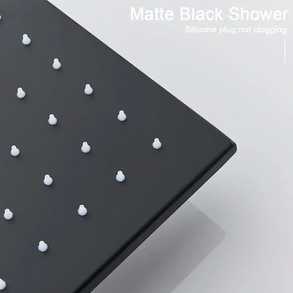 Matte black modern led rainfall shower head panel with evenly spaced white silicone plugs for luxury bathroom use