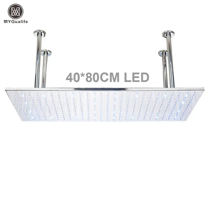 Chromed rectangular led rainfall shower head with integrated water jets and sleek modern design for luxury bathroom use