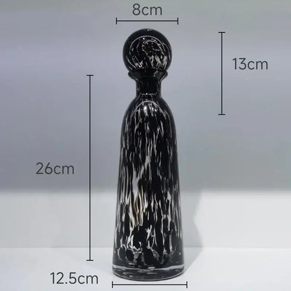 A sleek black and white marbled glass decanter with leopard texture measuring 26cm for modern decorbites decor