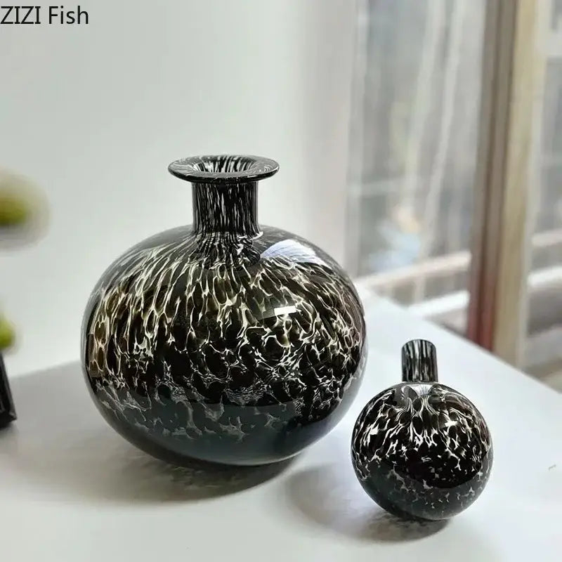 Elegant black glass decanter with swirling white leopard texture pattern for modern dining room decorbites leopard texture