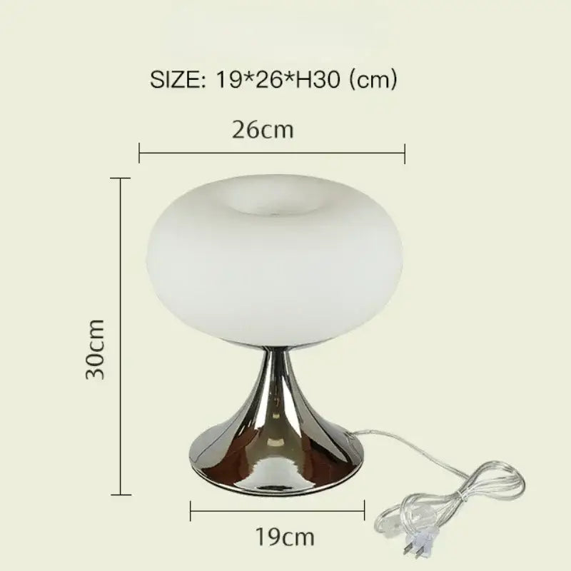 A sleek modern glass desk lamp with frosted white glass globe and polished chrome base featured with decorbites glass desk