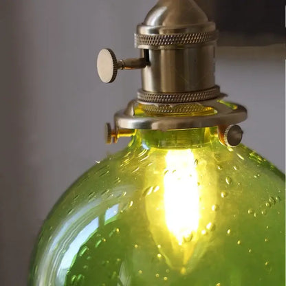 Modern lime and teal bubble glass ball pendant light with green glass and brass fixture for living room decorbites bubble glass