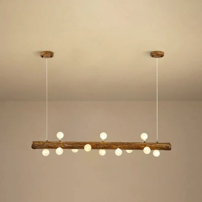 Rustic brown modern linear island pendant light featuring wooden log design with evenly spaced spherical bulbs metal lamp